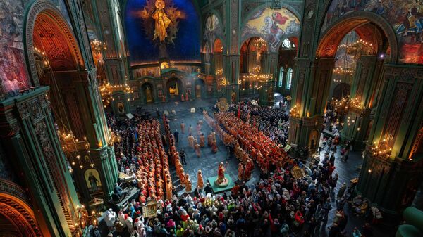 Божественная литургия в День памяти святого великомученика Георгия Победоносца и праздника Иверской