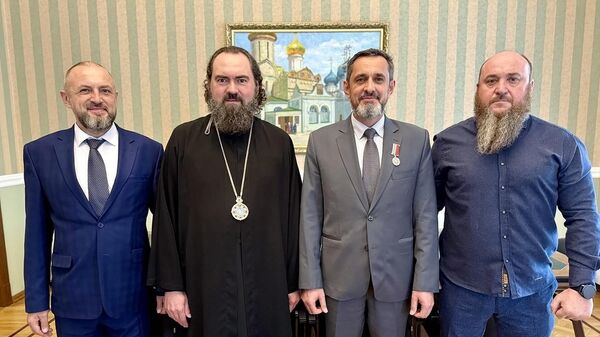 Атаман Терского казачьего войска Владимир Савченко, архиепископ Пятигорский и Черкесский Феофилакт, атаман Всероссийского казачьего общества Виталий Кузнецов и атаман Горячеводского казачьего общества Тимофей Деревянко