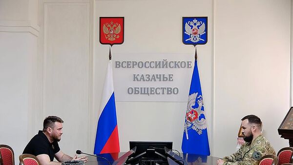 Атаман Уссурийского казачьего войска Александр Агибалов и советник атамана Всероссийского казачьего общества, депутат законодательного собрания Запорожской области Алексей Ясинский