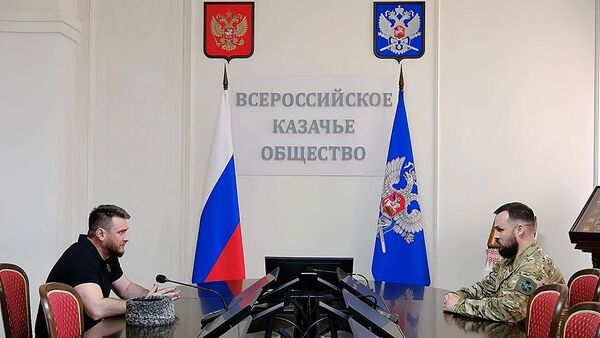 Атаман Уссурийского казачьего войска Александр Агибалов и советник атамана Всероссийского казачьего общества, депутат законодательного собрания Запорожской области Алексей Ясинский