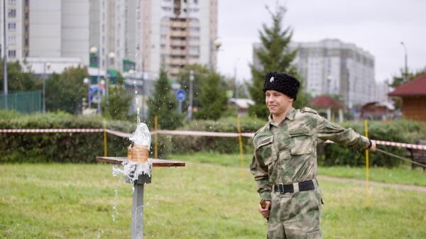 Участник соревнований на фестивале казачьего воинского искусства Участник соревнований на фестивале казачьего воинского искусства