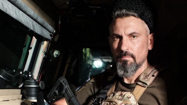 Боец-казак в зоне проведения СВО, фото Артура Емельянова Боец-казак в зоне проведения СВО, фото Артура Емельянова