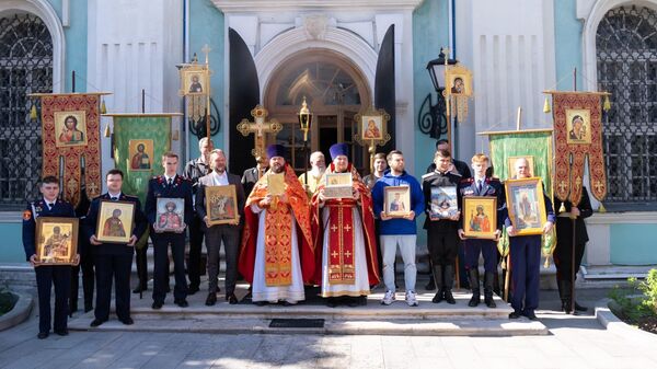 Ректор МГУТУ Арсений Миронов, иерей Тимофей Чайкин, иерей Тихон Лазуткин и казаки 