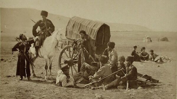 Группа терских казаков во время остановки в пути. Дмитрий Никитин,  1877 - 1878

