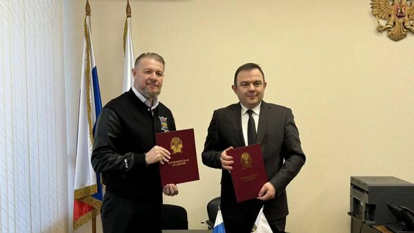 Атаман Оренбургского войскового казачьего общества Игорь Цыганов и директор Челябинского филиала РАНХиГС Евгений Алдошенко