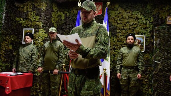 Церемония верстания в казаки бойцов добровольческого отряда БАРС-6 Форштадт