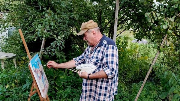 Юрий Смирнов у мольберта